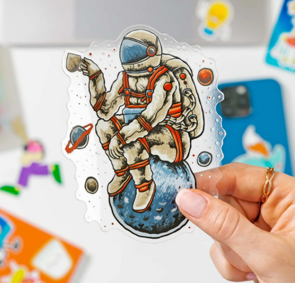 Custom clear die-cut astronaut sticker printed on transparent vinyl