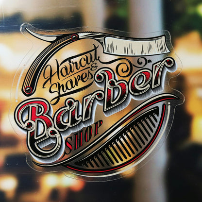 Custom clear vinyl barber shop sticker applied to a glass window